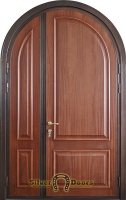Двустворчатая арочная дверь с отделкой